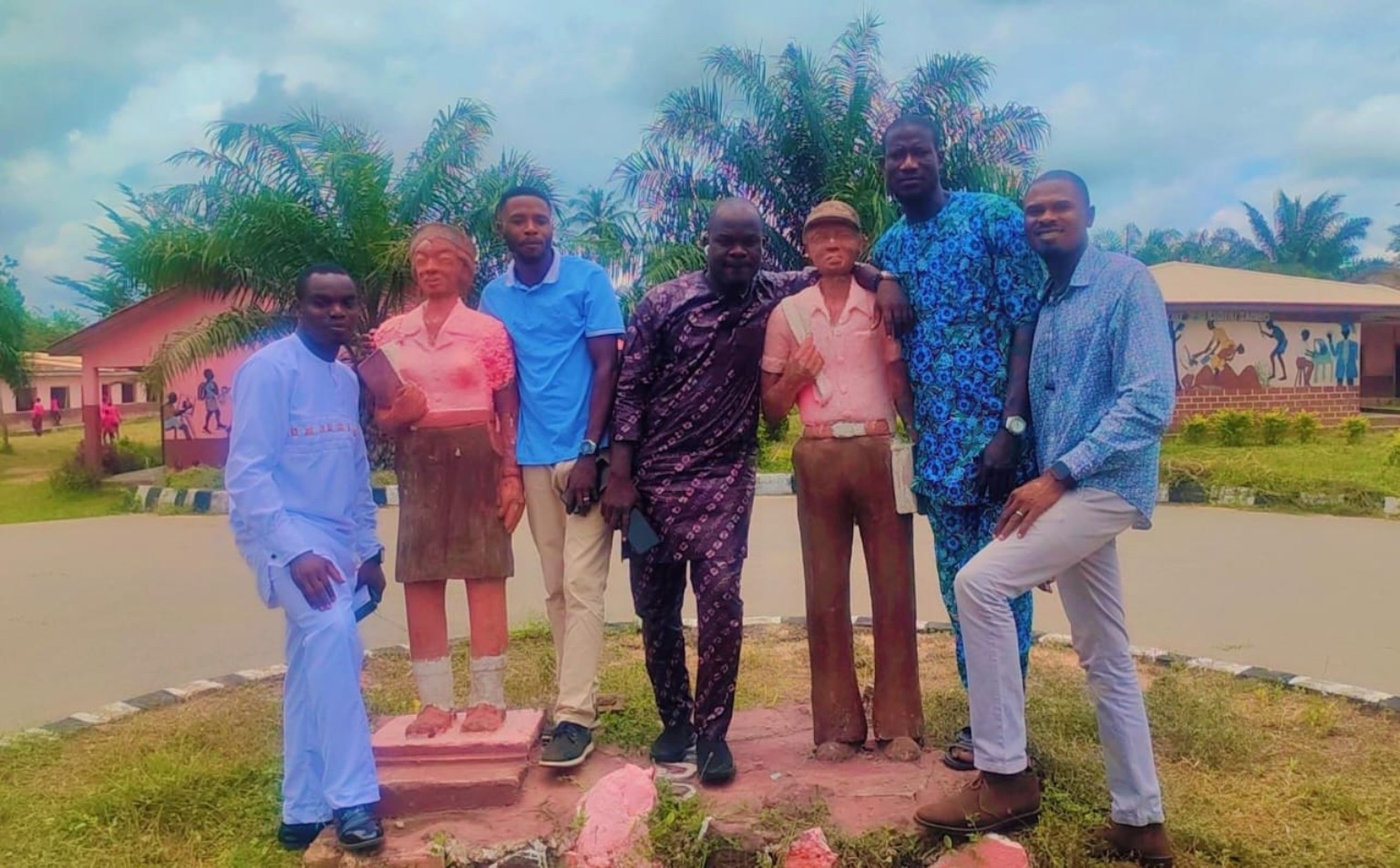 Alumni together on the school grounds