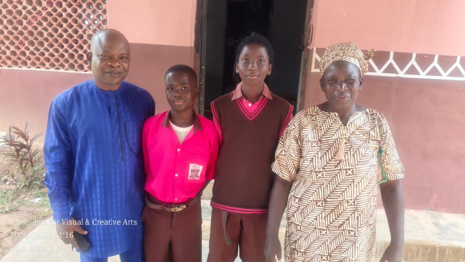 A group photograph with students at the school